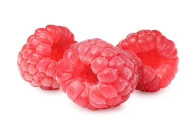 Three tasty ripe raspberries isolated on white