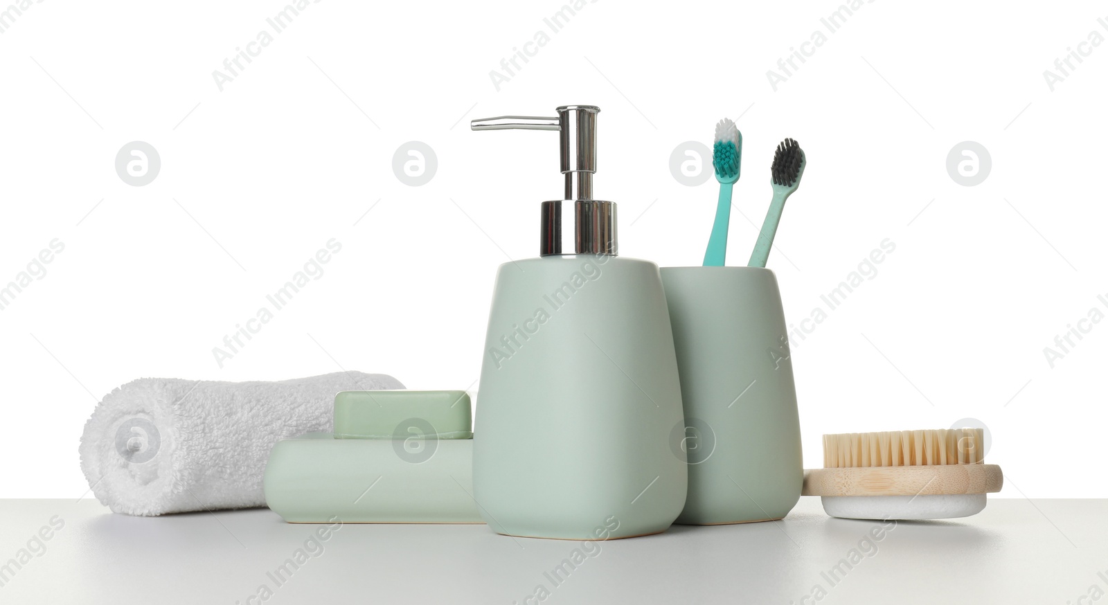 Photo of Bath accessories. Different personal care products on table against white background