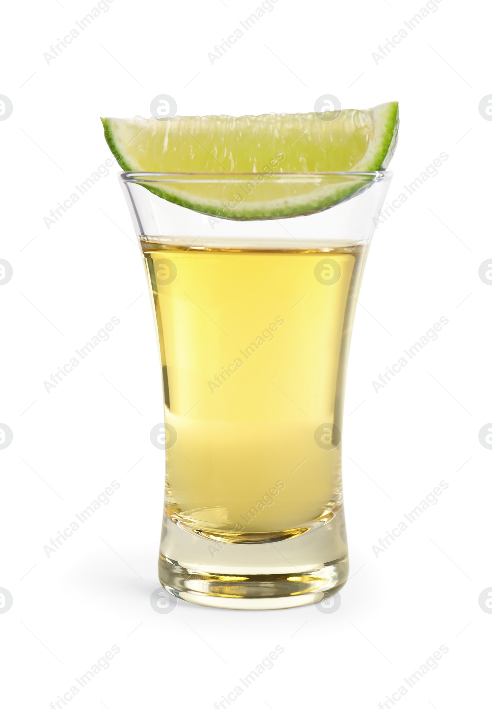 Photo of Mexican Tequila shot with lime slice isolated on white