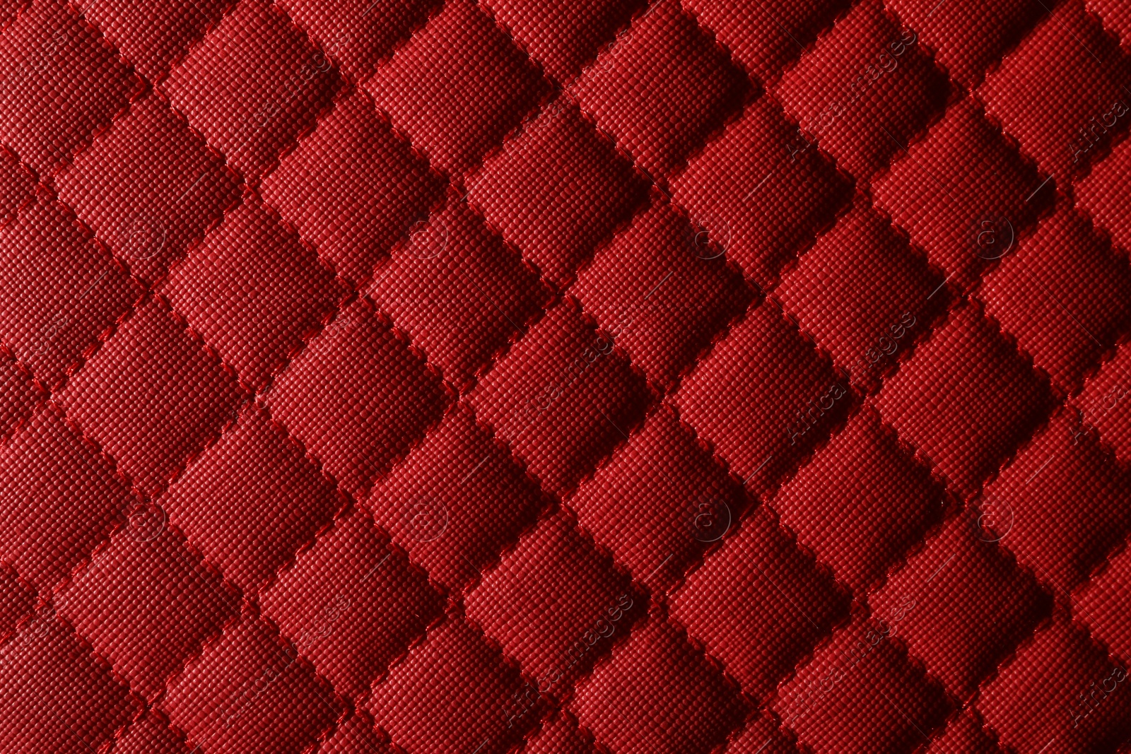 Photo of Texture of red leather as background, closeup