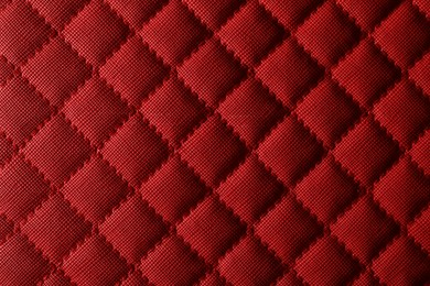 Photo of Texture of red leather as background, closeup