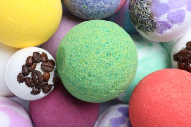 Photo of Colorful bath bombs as background, above view