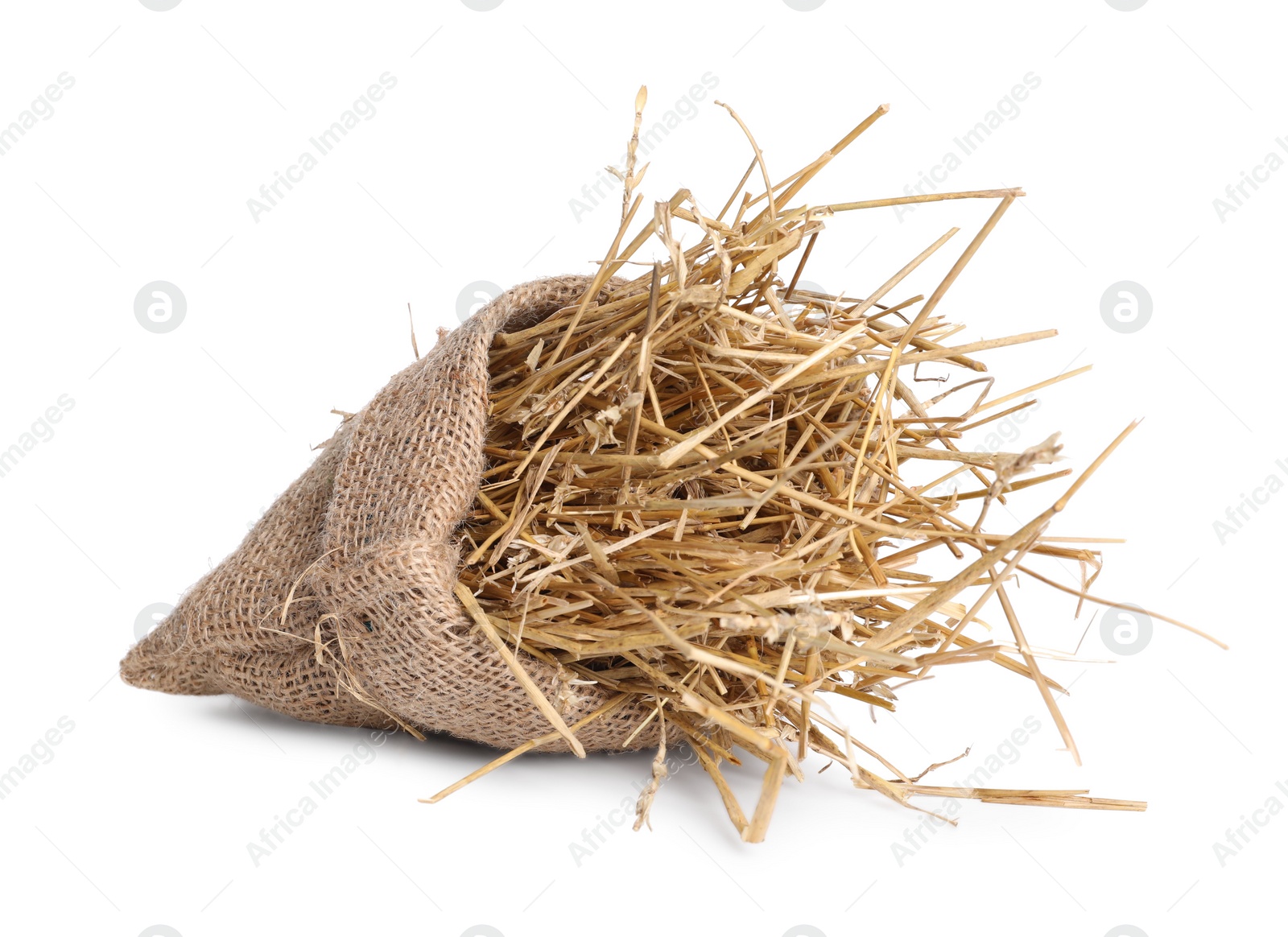 Photo of Dried straw in burlap sack isolated on white