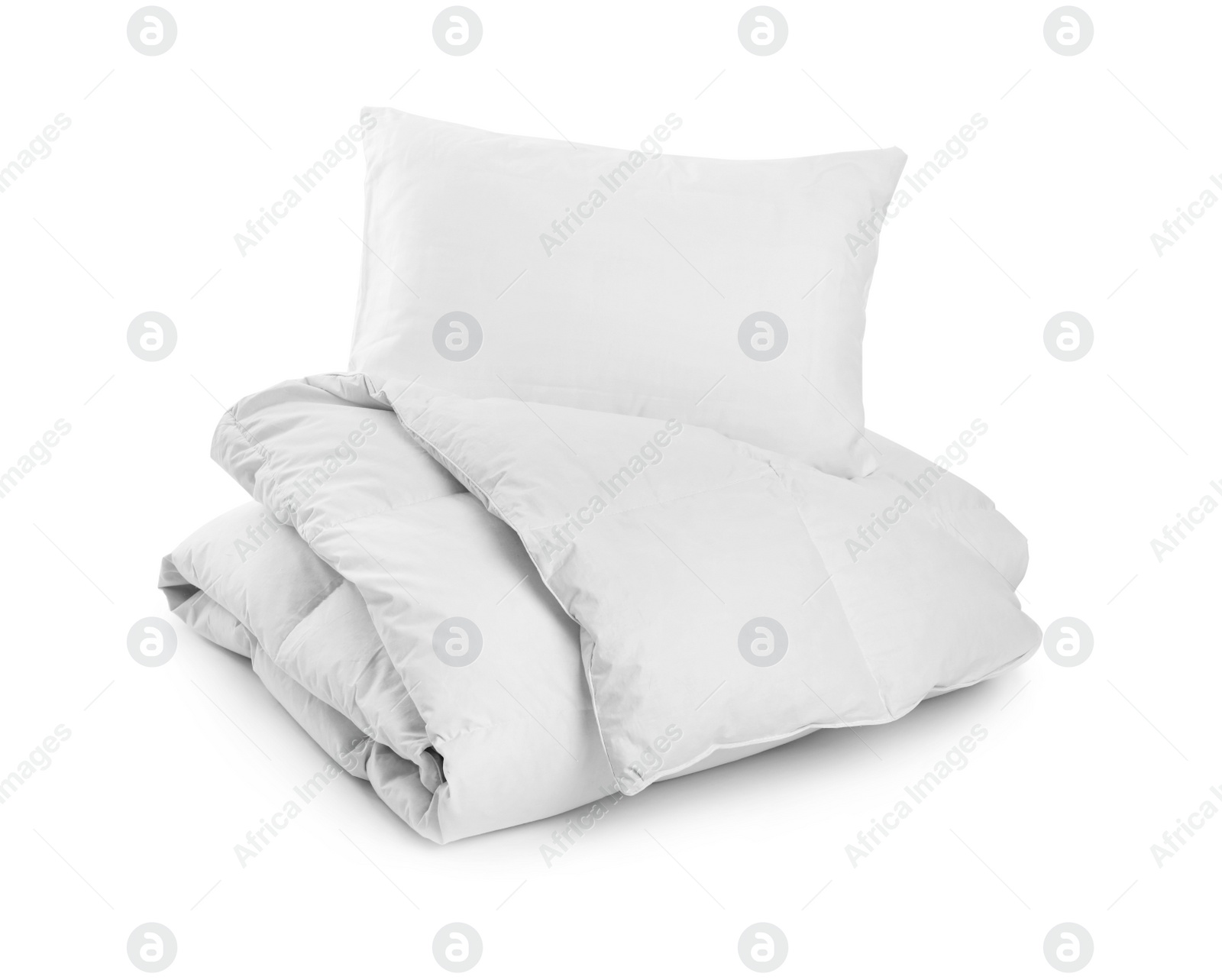 Photo of Clean blanket and pillow on white background