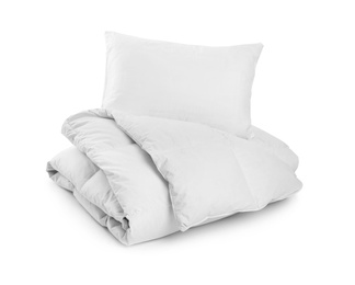 Photo of Clean blanket and pillow on white background