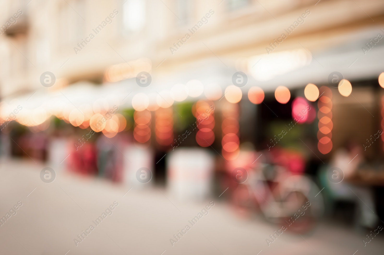 Photo of Blurred view of cafe with outdoor terrace