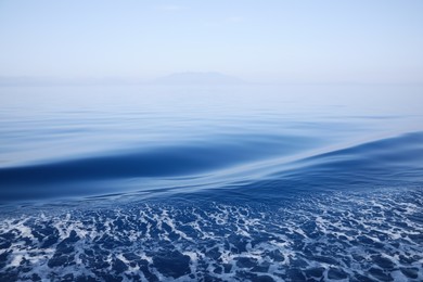 Photo of Surface of beautiful sea water on foggy day