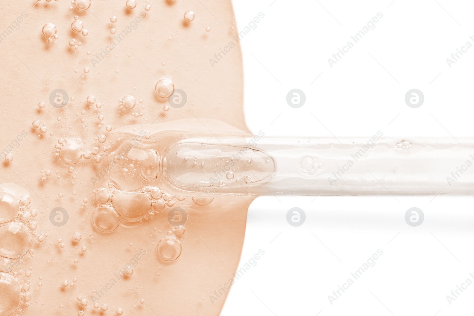 Image of Dropper with serum on white background, top view. Skin care product