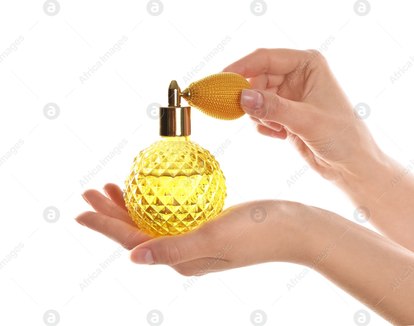 Photo of Woman holding bottle of luxury perfume on white background, closeup