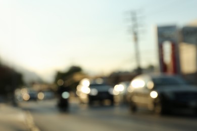 Photo of Blurred view of road with cars, bokeh effect