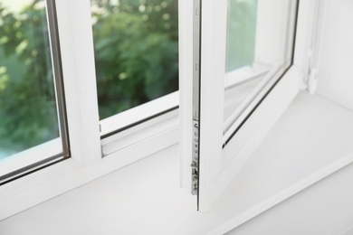 Modern window indoors, closeup view. Home interior