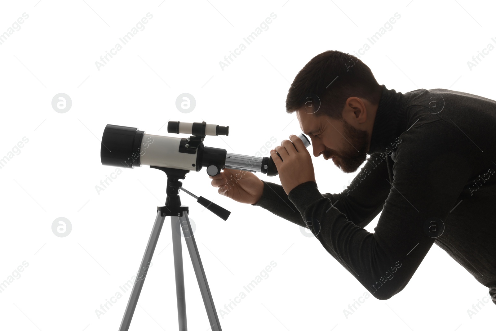 Photo of Astronomer looking at stars through telescope on white background