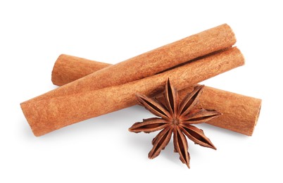 Aromatic cinnamon sticks and anise star isolated on white