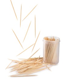 Holder with wooden toothpicks on white background