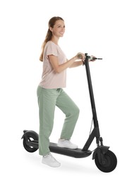 Happy woman with modern electric kick scooter on white background