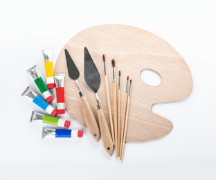 Photo of Set of painting tools for children on white background, top view