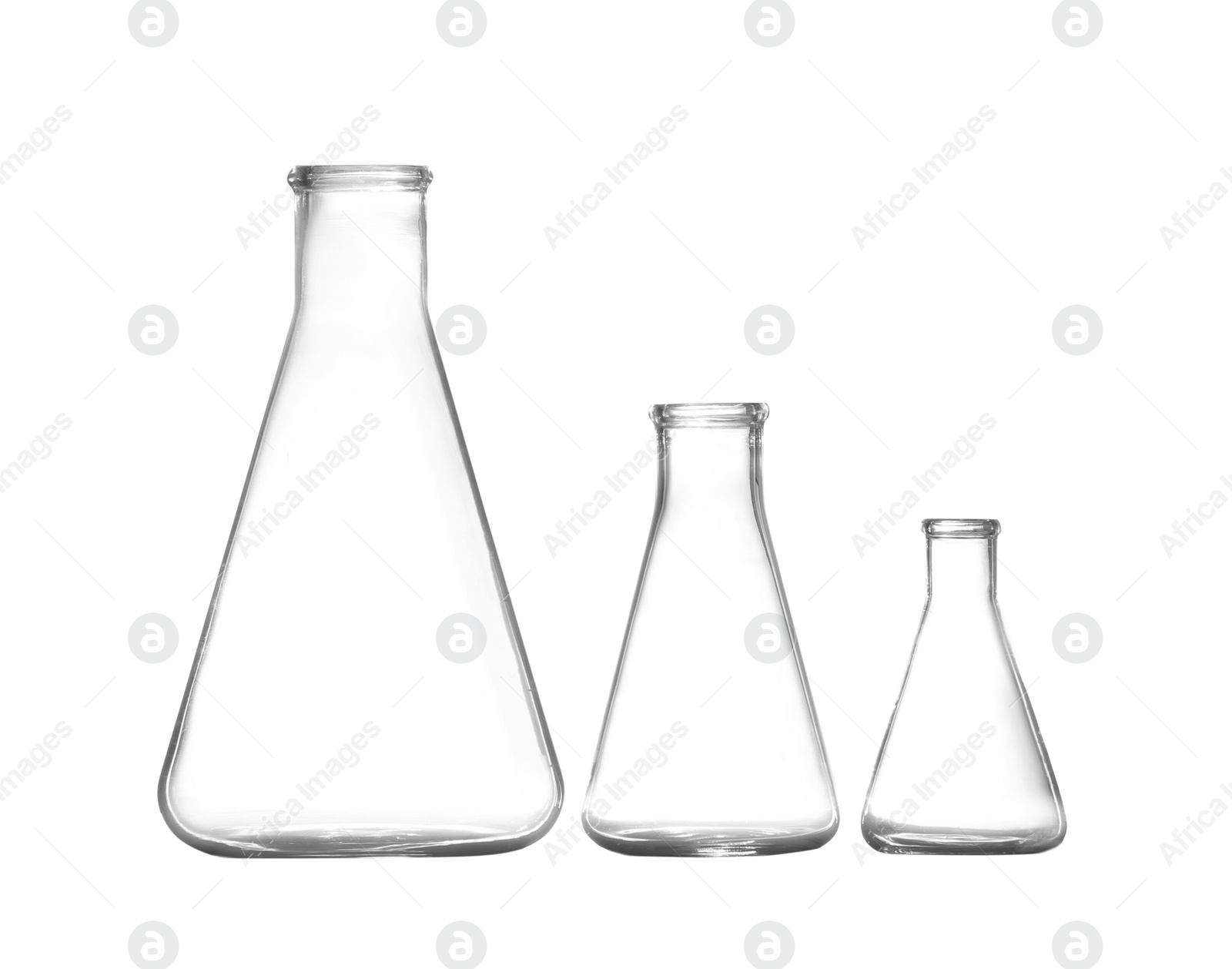 Photo of Empty conical flasks on white background. Chemistry glassware