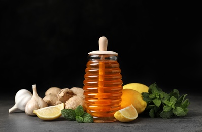 Photo of Composition with natural cough remedies on table