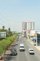 Photo of SAN PEDRO GARZA GARCIA, MEXICO - AUGUST 29, 2022: Cars in traffic jam on city street, aerial view