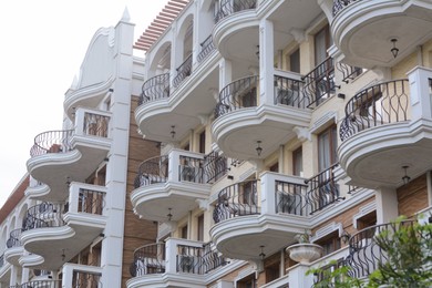 Photo of Exterior of beautiful residential building with balconies