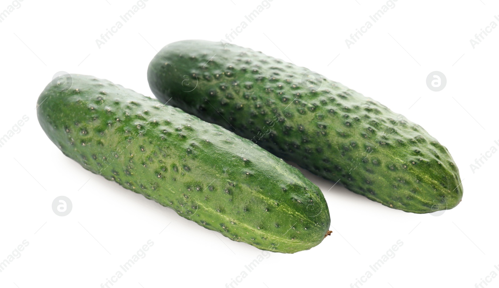 Photo of Whole fresh green cucumbers on white background