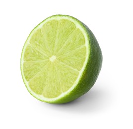 Half of fresh green ripe lime isolated on white