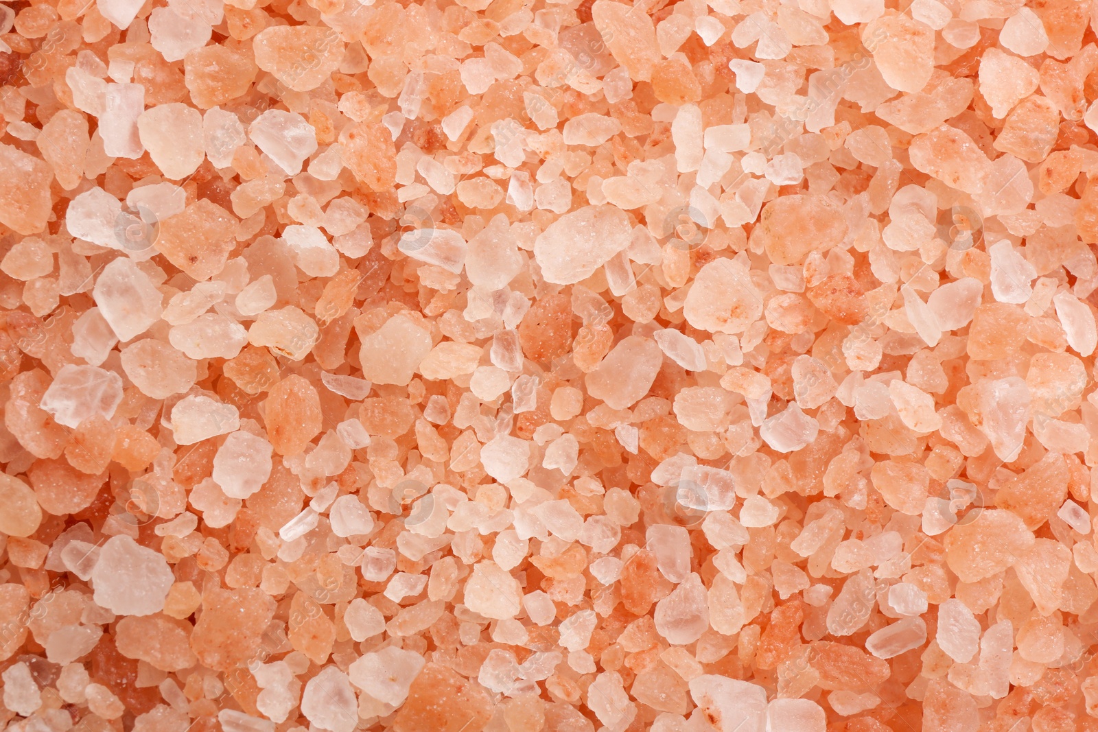 Photo of Pink himalayan salt as background, top view