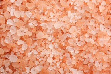 Photo of Pink himalayan salt as background, top view