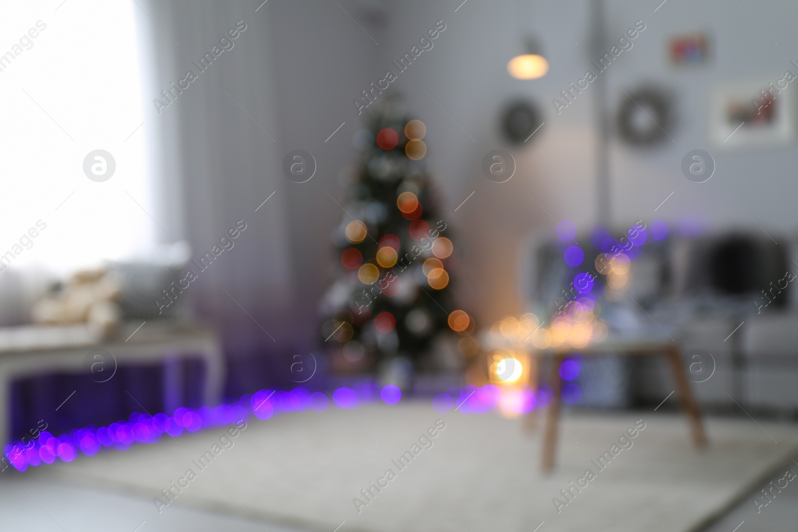 Photo of Blurred view of living room with beautiful Christmas tree