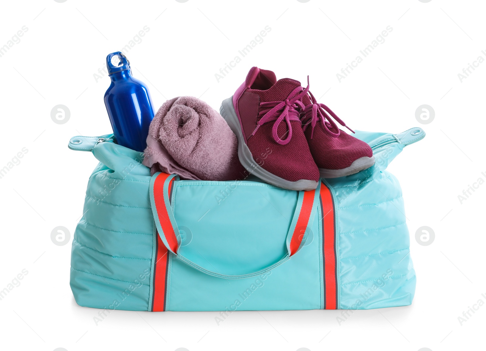 Photo of Sports bag with gym equipment on white background