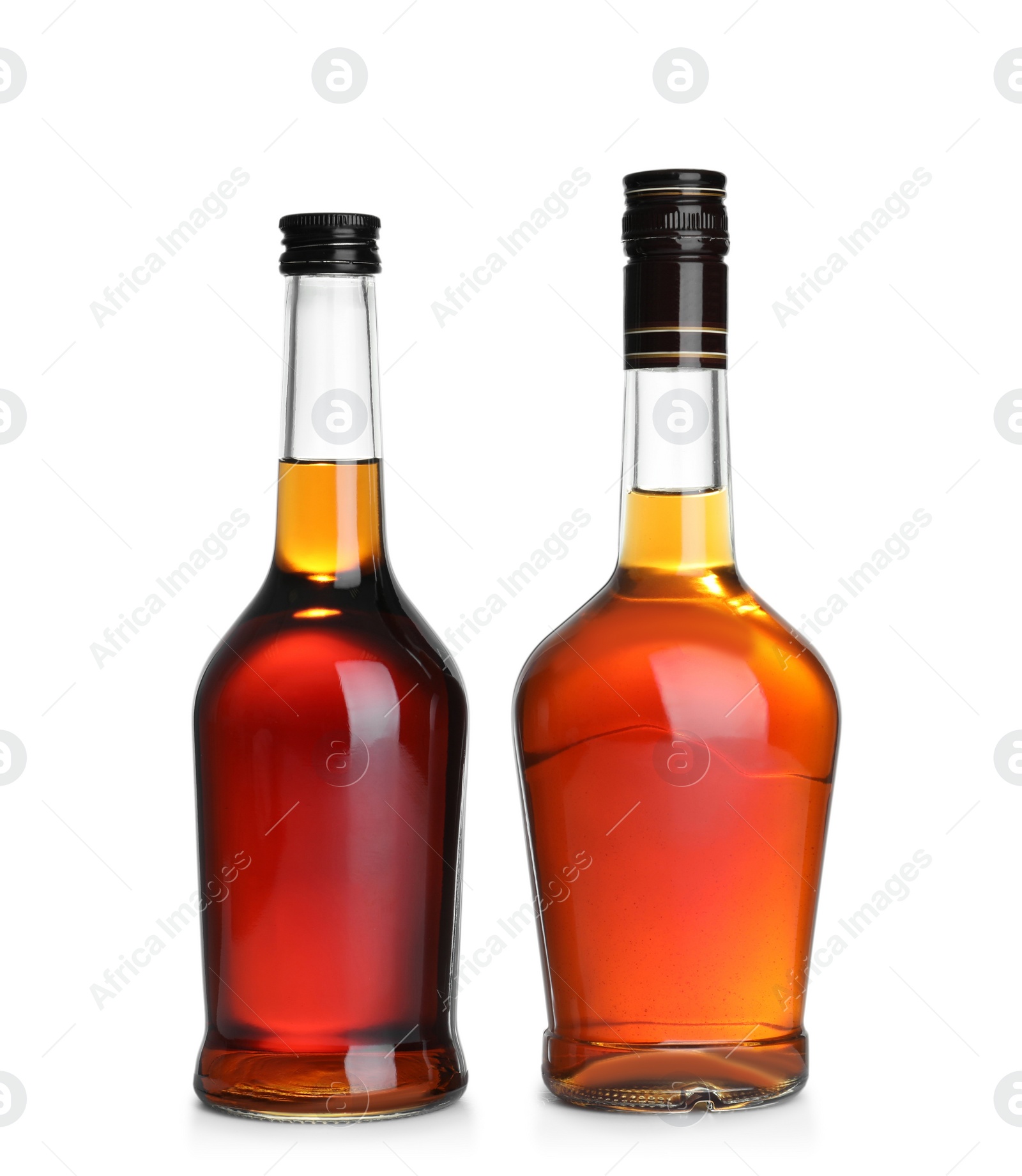 Photo of Bottles of scotch whiskey on white background