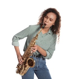 Beautiful African American woman playing saxophone on white background