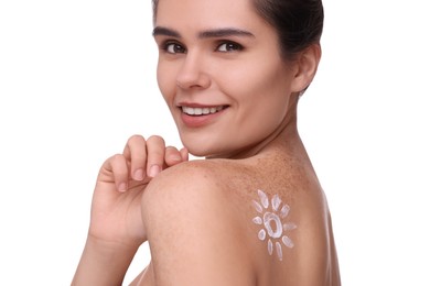 Beautiful young woman with sun protection cream on her back against white background