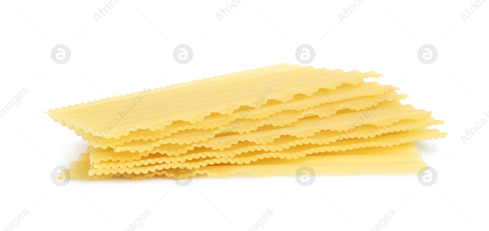 Photo of Stack of uncooked lasagna sheets isolated on white