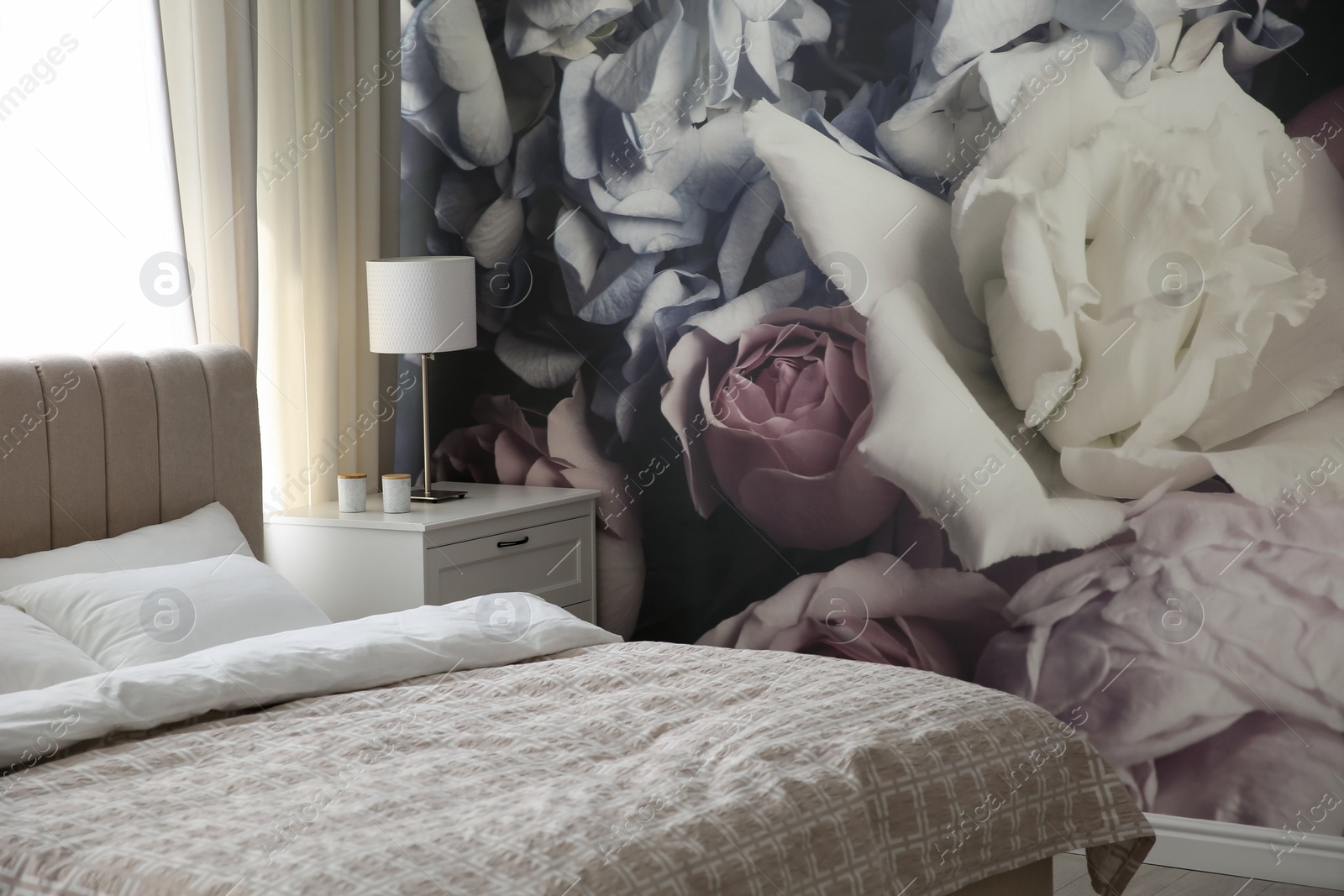 Photo of Beautiful floral photoart work used as wallpaper in bedroom interior