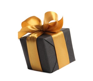 Photo of Beautiful gift box with golden ribbon and bow on white background