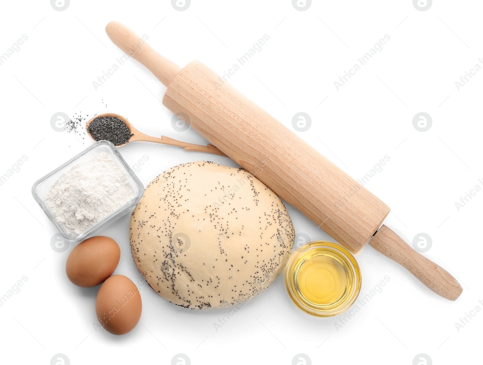 Photo of Raw dough with poppy seeds, rolling pin and ingredients on white background, top view