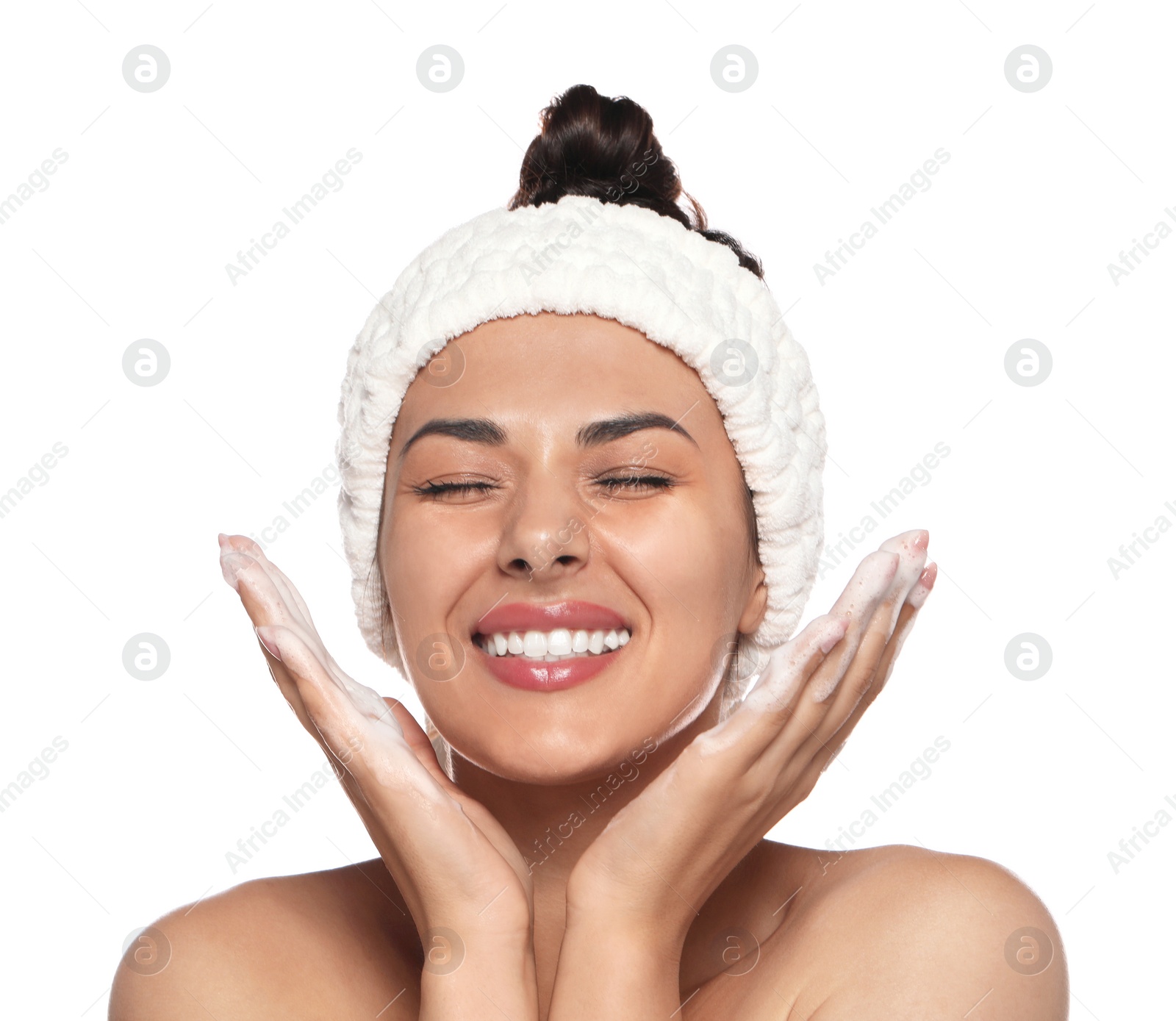 Photo of Beautiful woman applying facial cleansing foam on white background