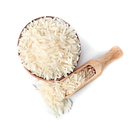 Bowl and scoop with uncooked long grain rice on white background, top view