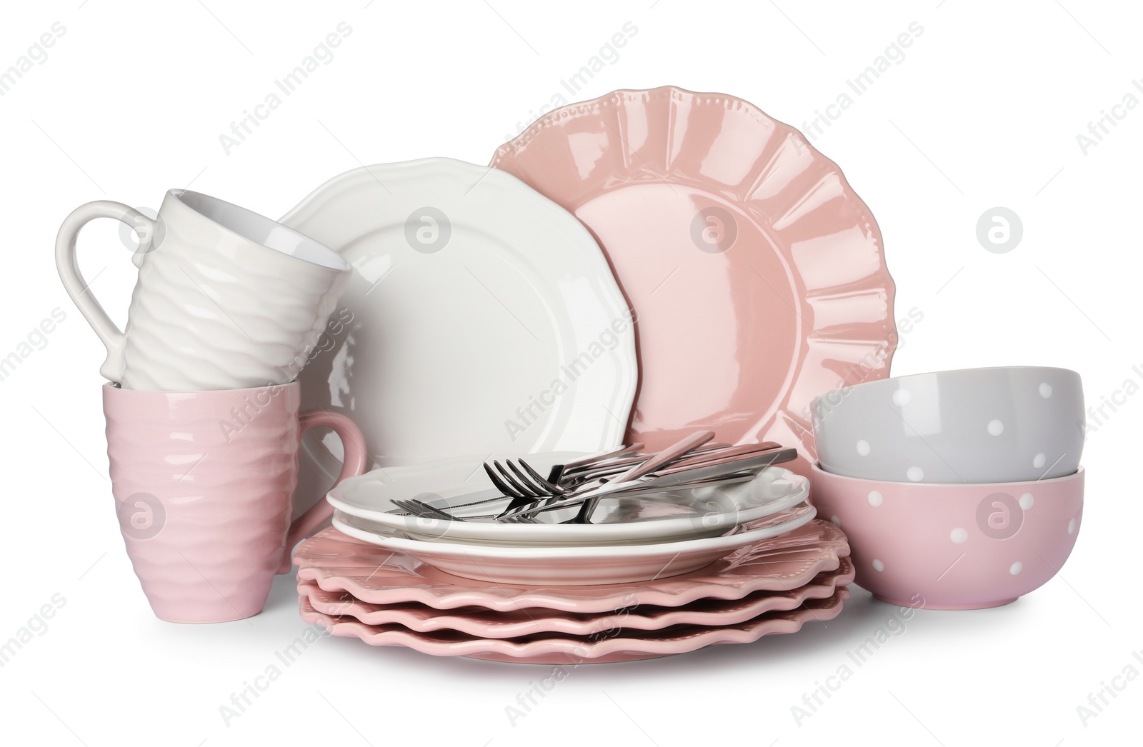 Photo of Set of beautiful ceramic dishware and cutlery isolated on white