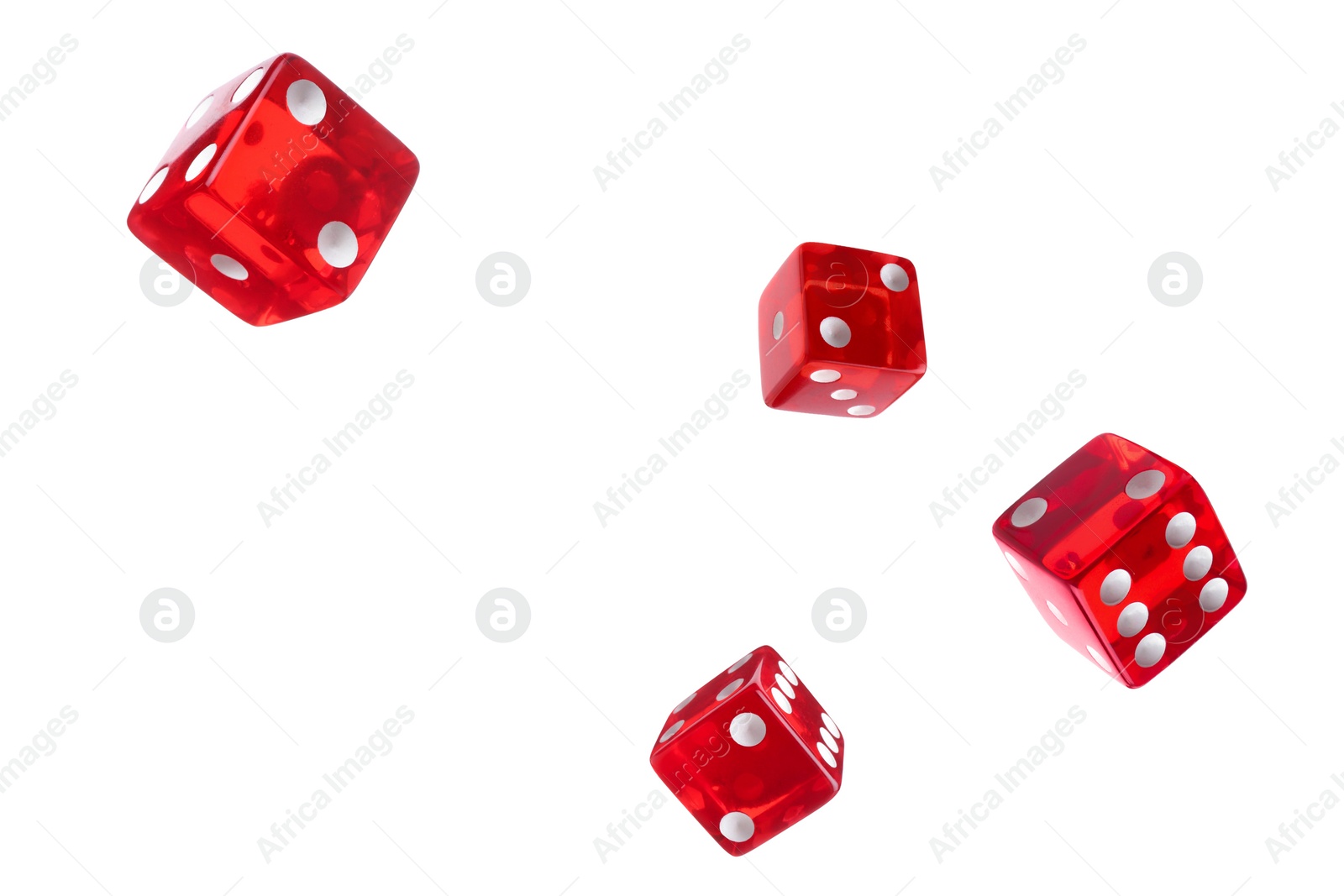 Image of Four red dice in air on white background