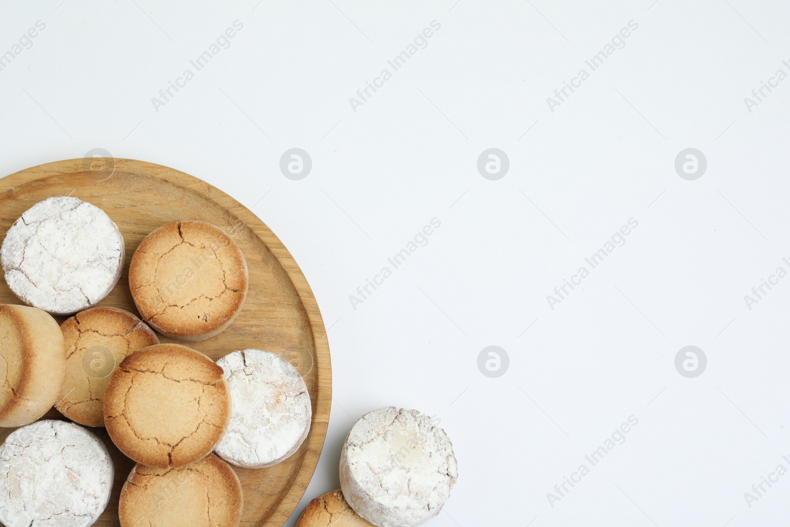 Photo of Sweet homemade tasty cookies on white background, top view