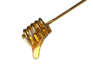 Photo of Honey pouring from metal dipper isolated on white