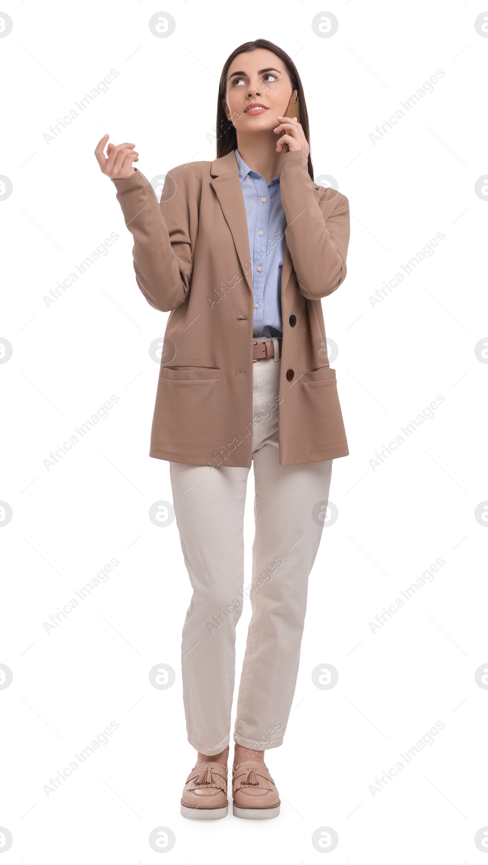 Photo of Beautiful businesswoman talking on smartphone against white background