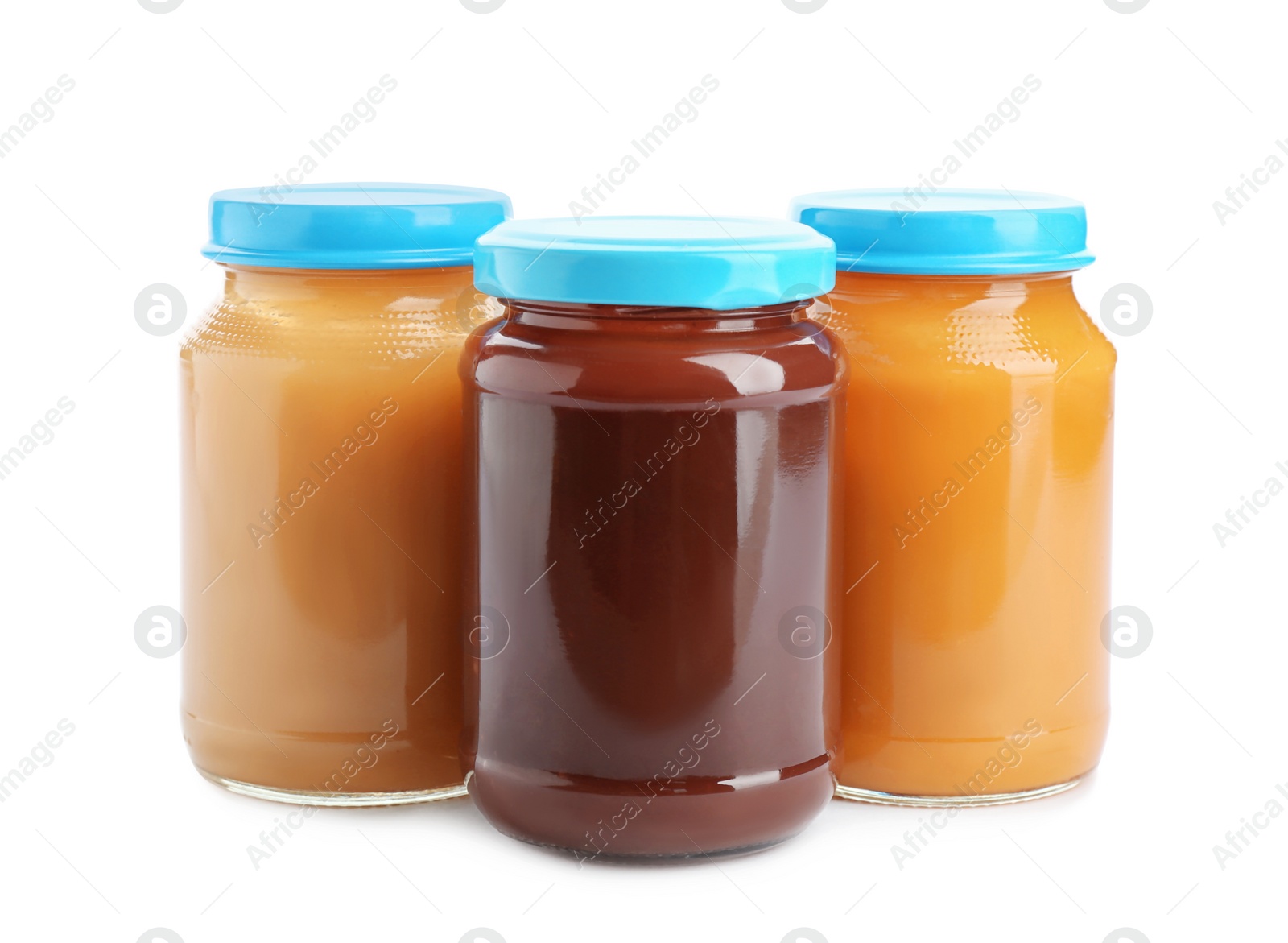 Photo of Jars with healthy baby food on white background