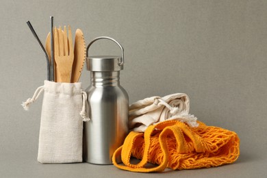 Composition with eco friendly products on grey background. Conscious consumption