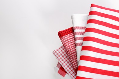 Photo of Stack of soft kitchen towels on white background