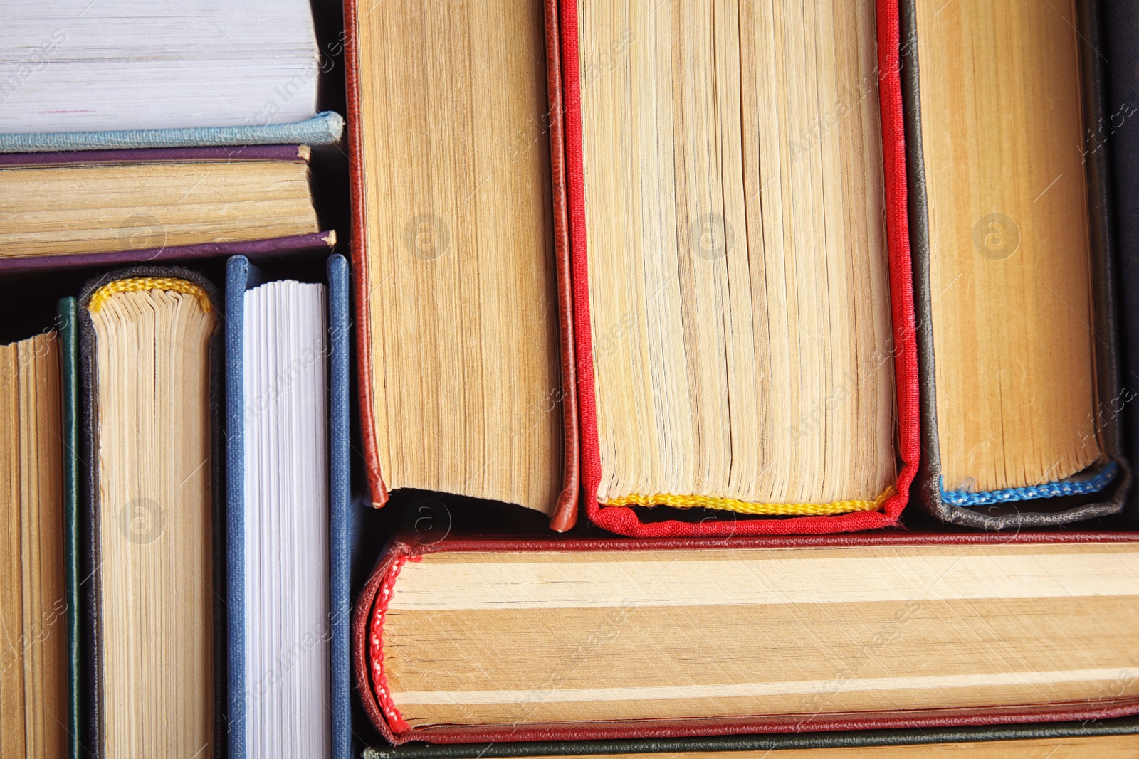 Photo of Many different hardcover books as background, top view