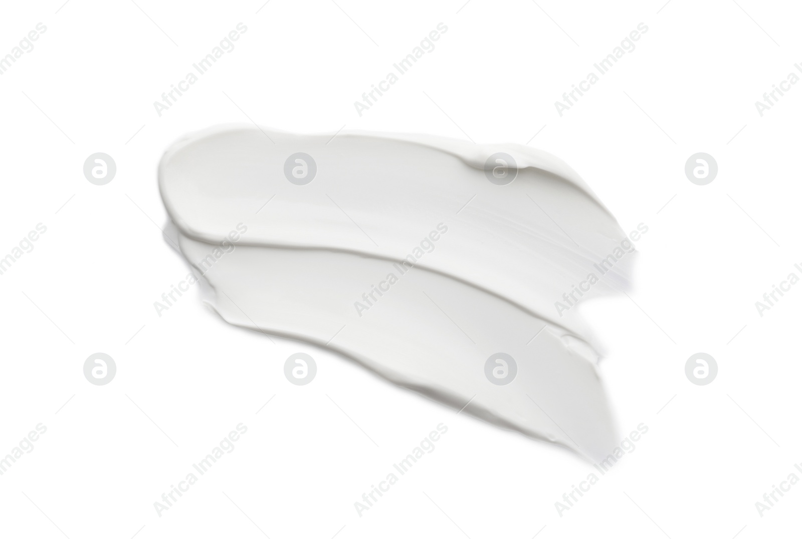 Photo of Samples of face cream on white background