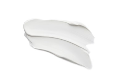 Samples of face cream on white background